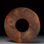 漢 黃玉穀紋泌色璧