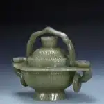 青玉雕葵花竹節紋提手籃
